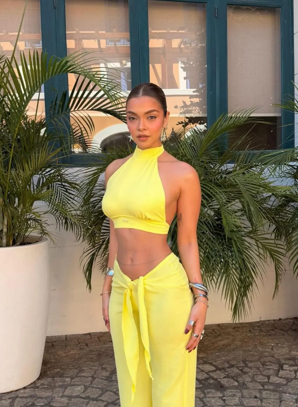 Yellow halter top and tie-waist pants